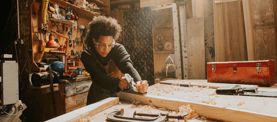 A maker working in her workshop